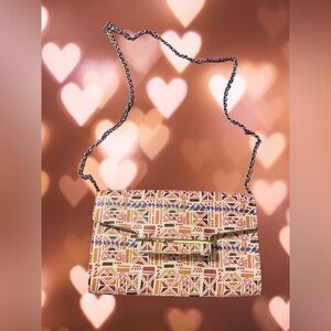 Multi colored Kelly and Katie purse.